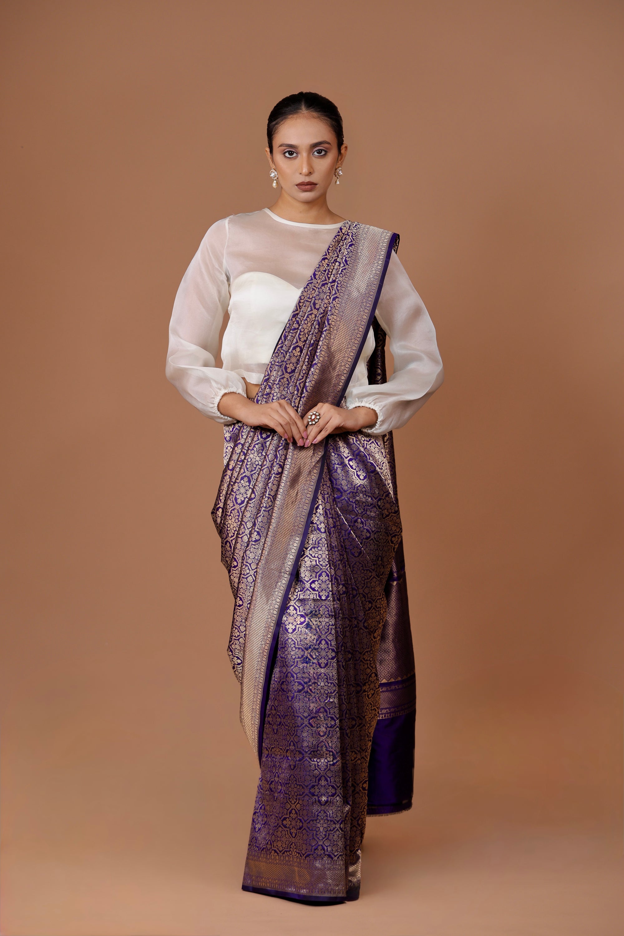 Exquisite Banarasi handwoven Navy Blue silk sari with timeless zari detailing and refined craftsmanship.