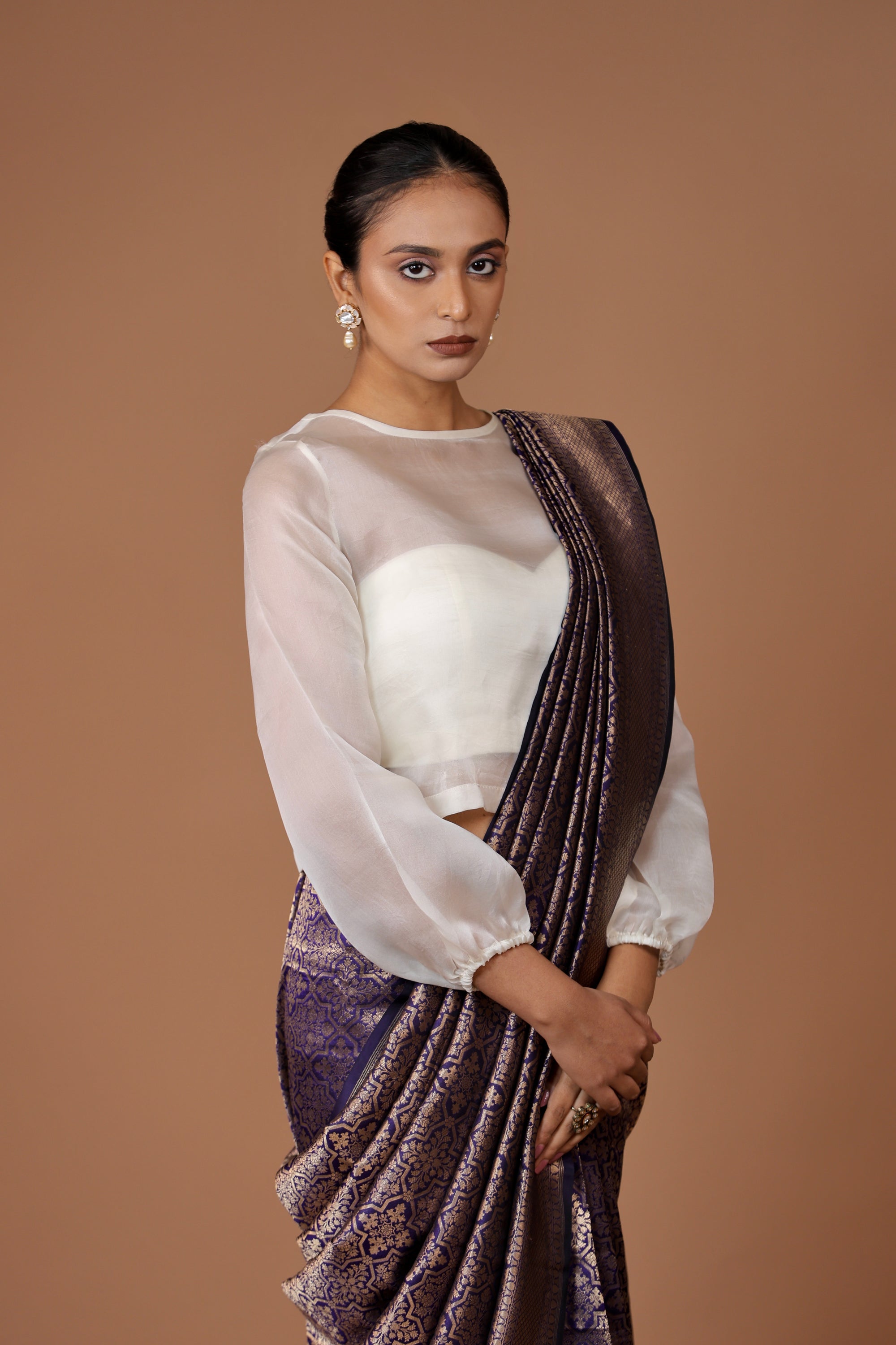 Exquisite Banarasi handwoven Navy Blue silk sari with timeless zari detailing and refined craftsmanship.