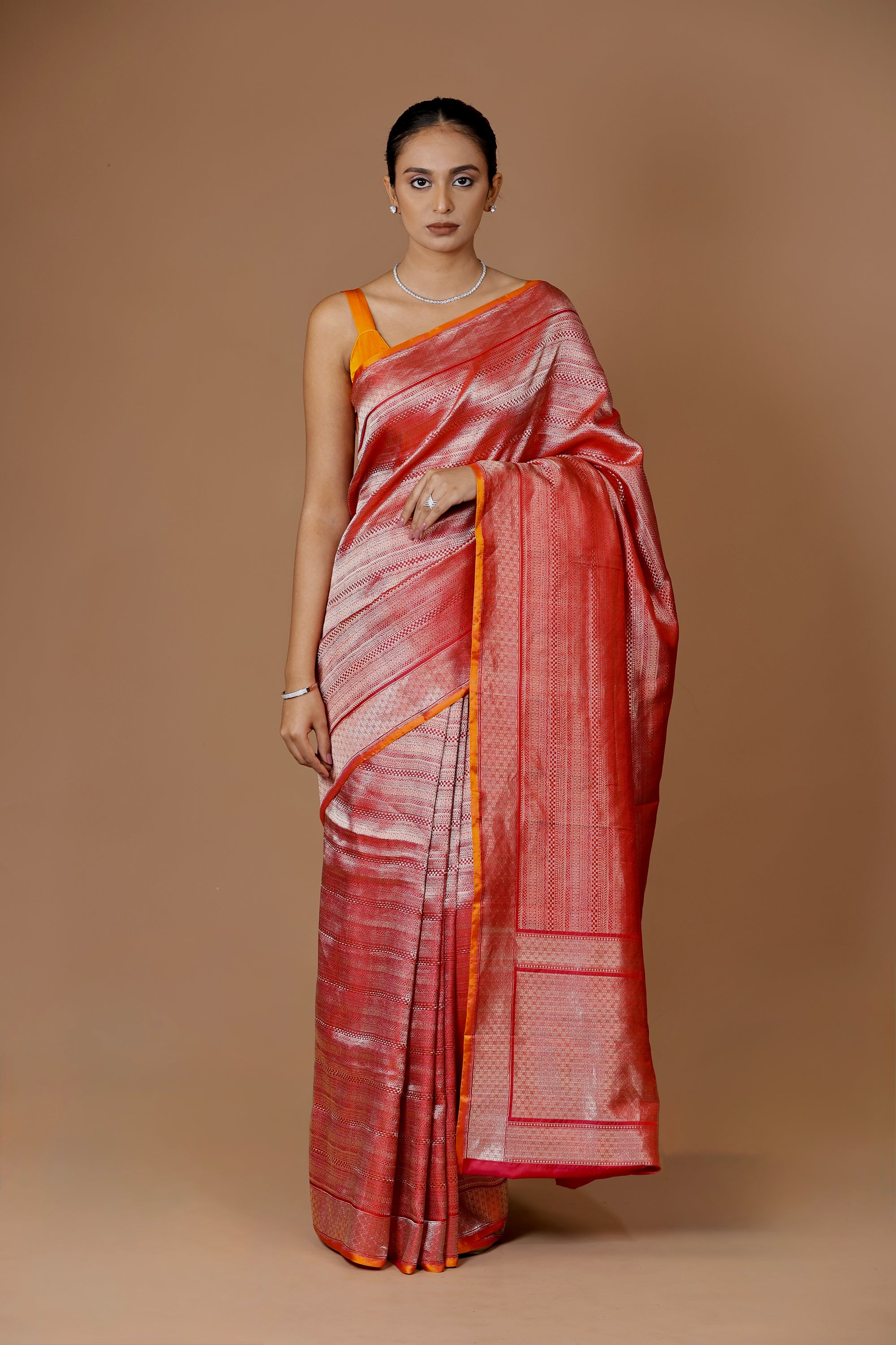 Elegant Banarasi handwoven Red Kadhua silk sari in rich hues with intricate weaving.