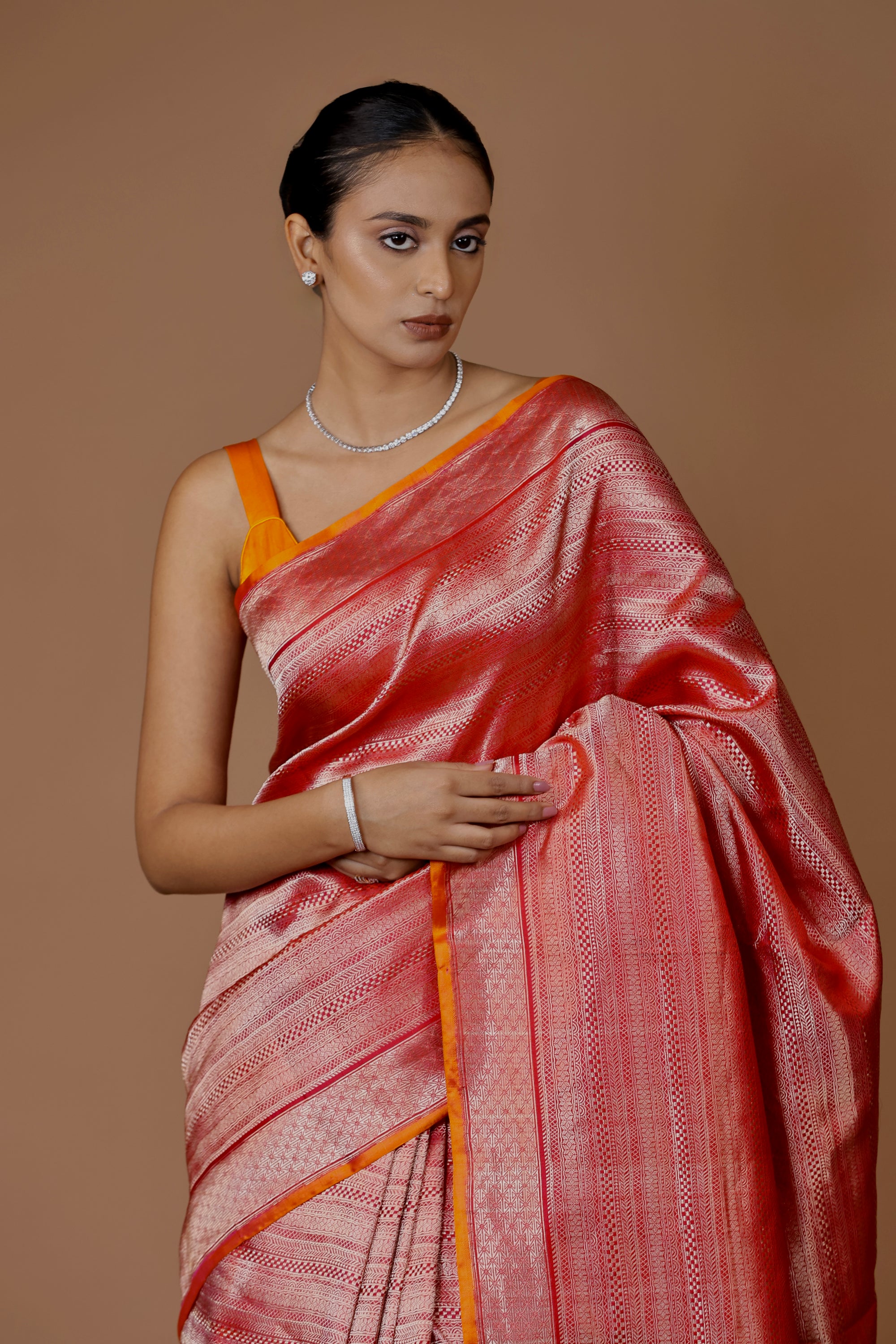 Elegant Banarasi handwoven Red Kadhua silk sari in rich hues with intricate weaving.