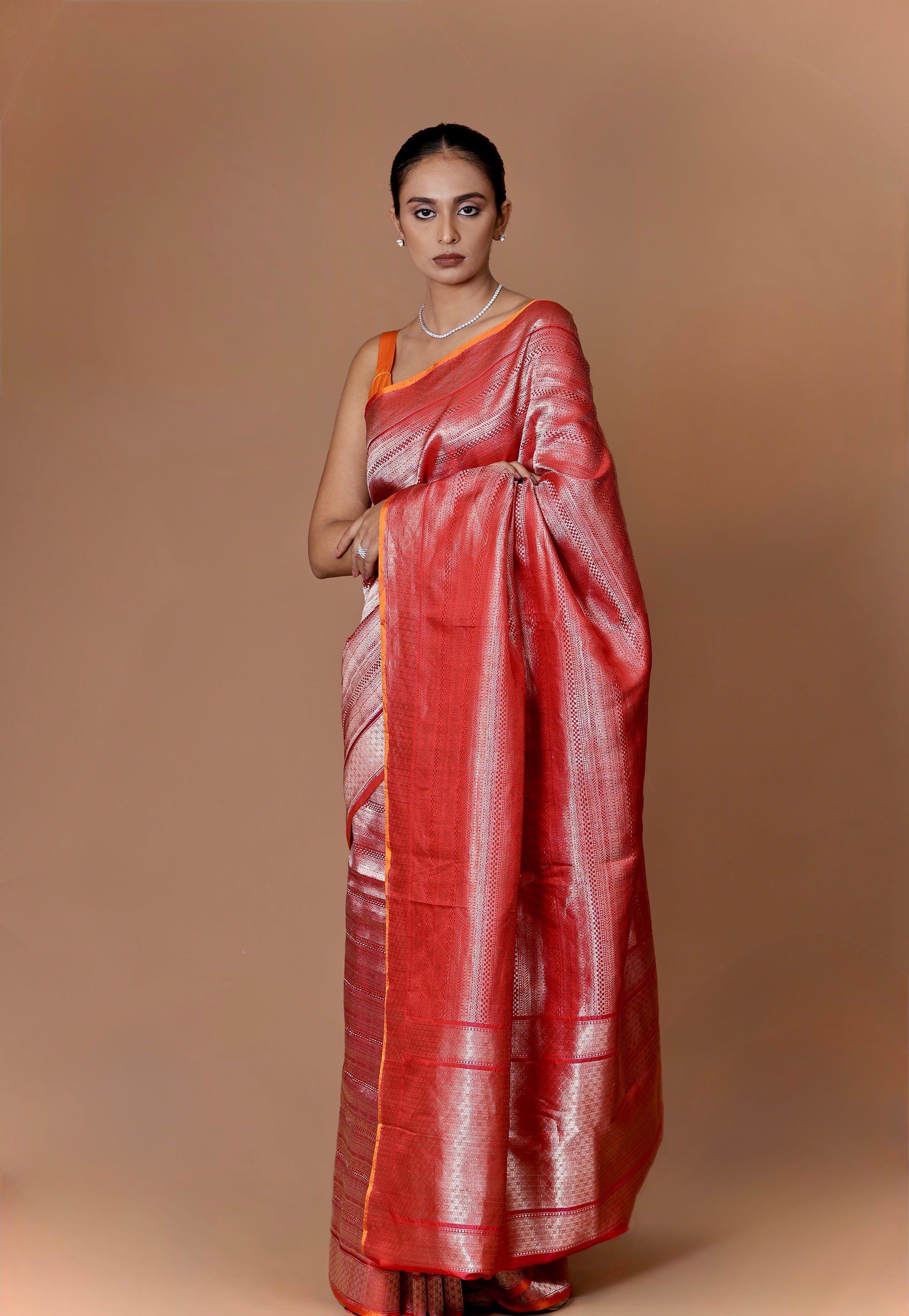 Elegant Banarasi handwoven Red Kadhua silk sari in rich hues with intricate weaving.