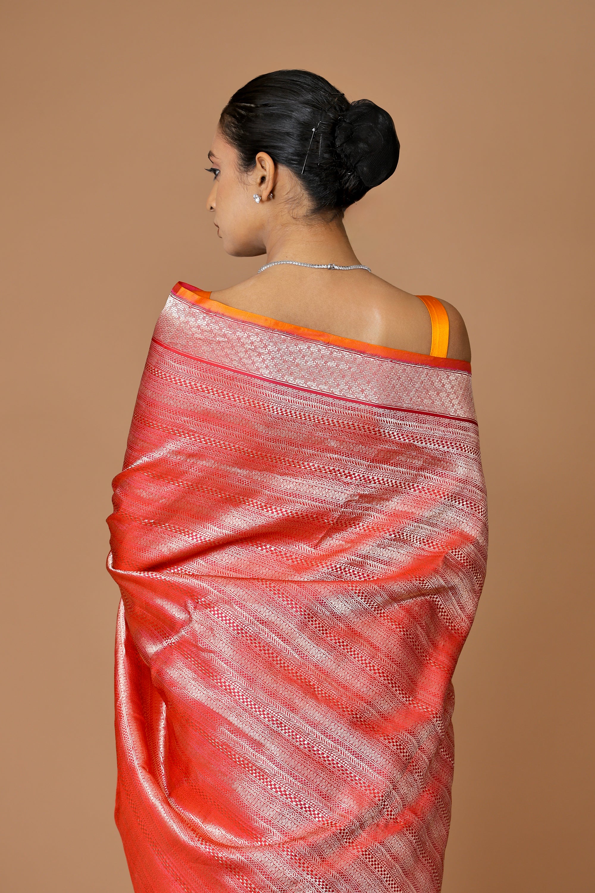 Elegant Banarasi handwoven Red Kadhua silk sari in rich hues with intricate weaving.
