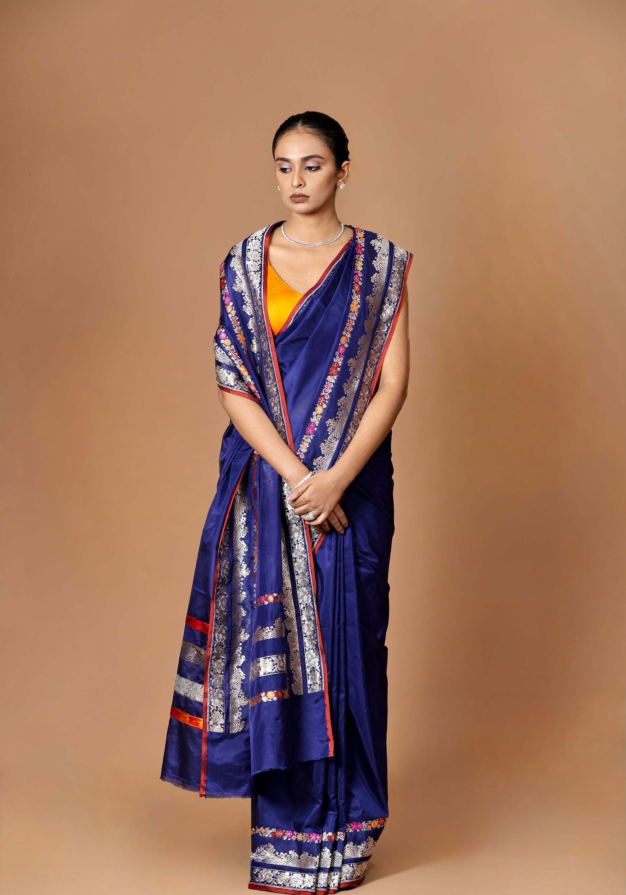 Banarasi handwoven blue Kadhua silk sari with intricate meenakari detailing, a timeless masterpiece.