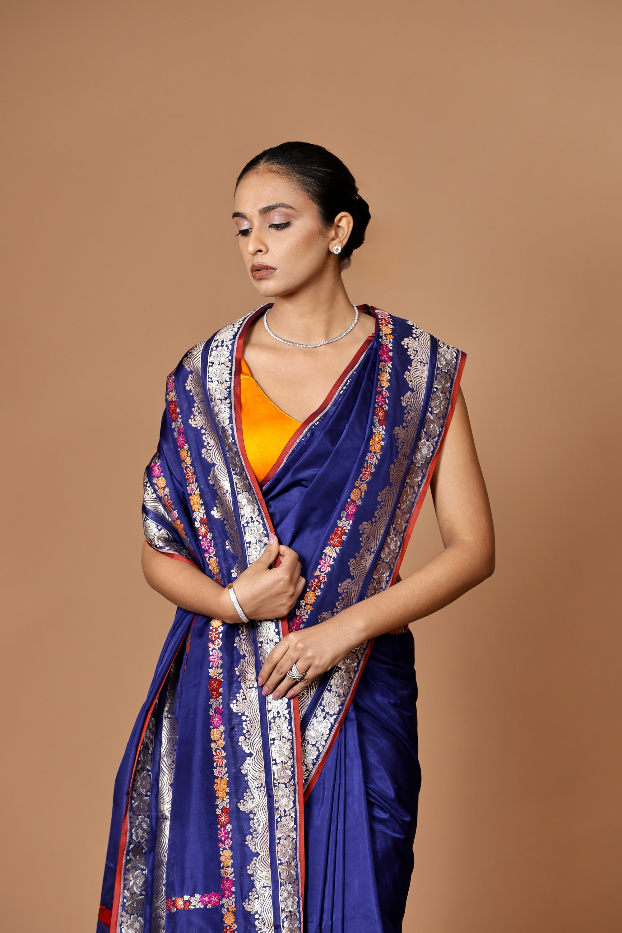 Banarasi handwoven blue Kadhua silk sari with intricate meenakari detailing, a timeless masterpiece.