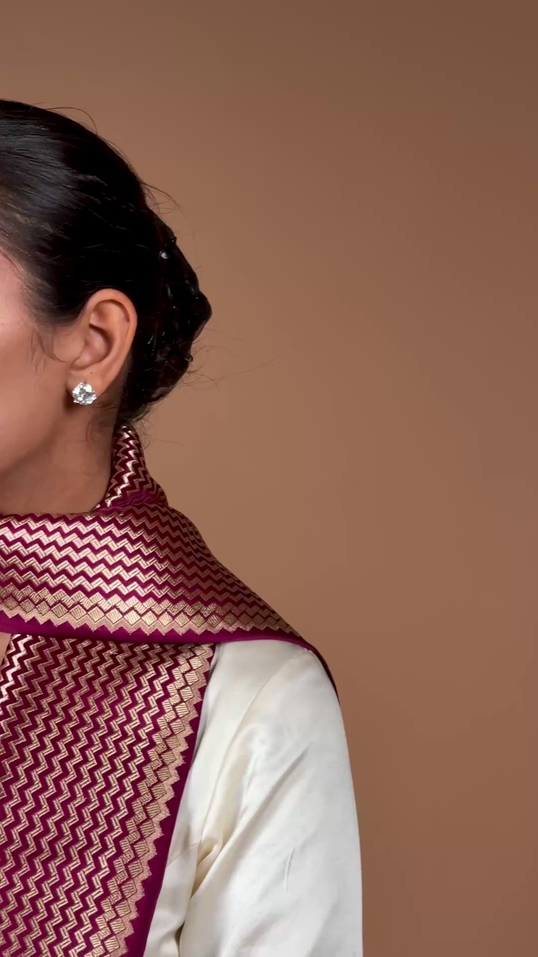 Exquisite Banarasi Tanchoi silk sari in deep Bordeaux, highlighted with a striking contrast border.