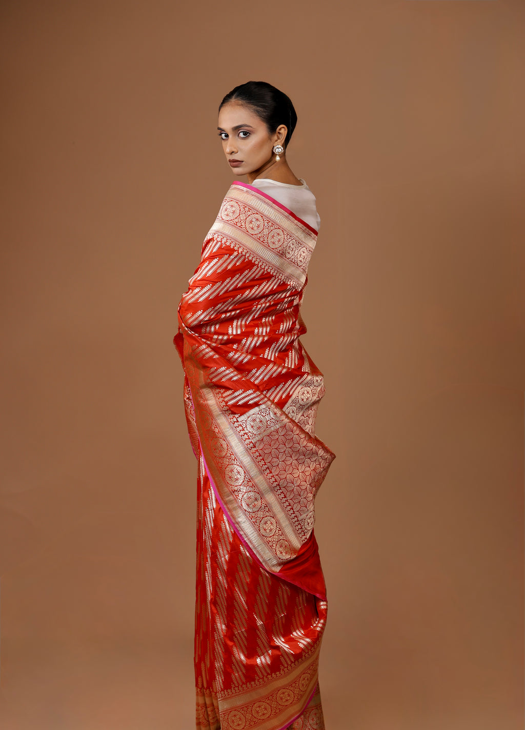 Banarasi handwoven Red silk sari in rich hues with intricate weaving.