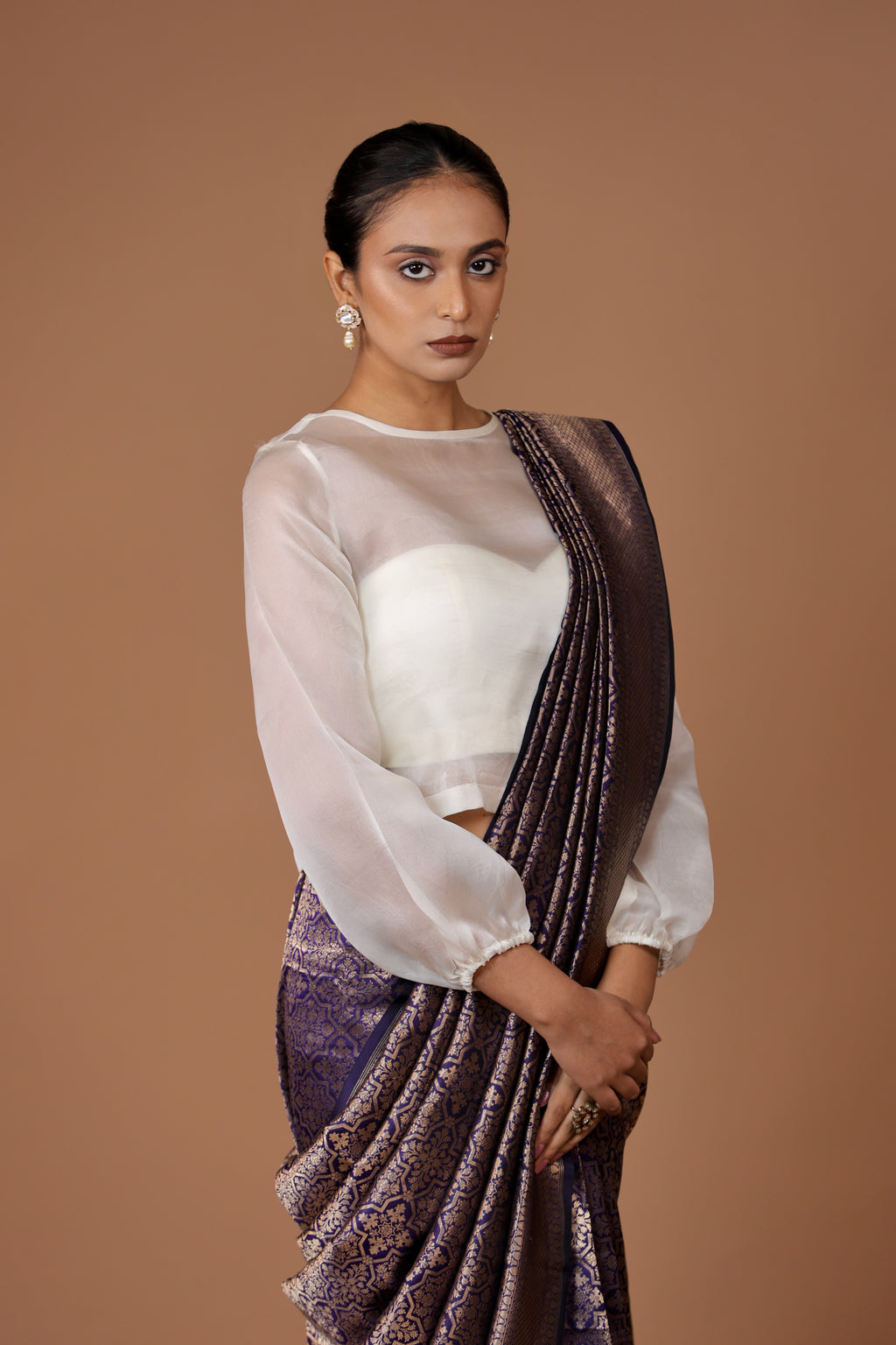 Exquisite Banarasi handwoven Navy Blue silk sari with timeless zari detailing and refined craftsmanship.