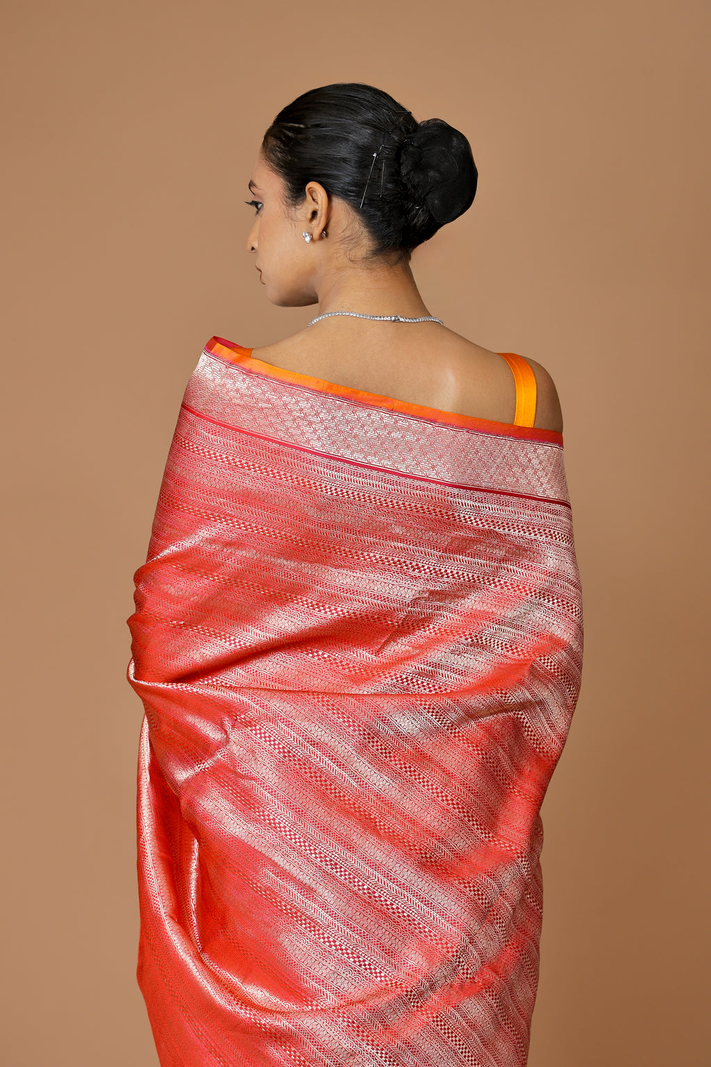 Elegant Banarasi handwoven Red Kadhua silk sari in rich hues with intricate weaving.
