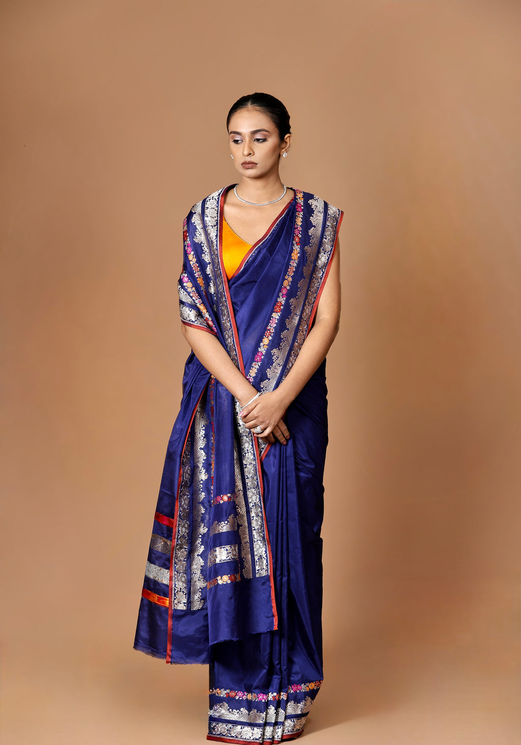 Banarasi handwoven blue Kadhua silk sari with intricate meenakari detailing, a timeless masterpiece.