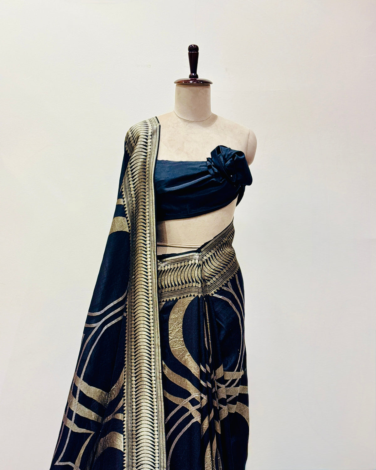 Black handwoven contemporary Muga Georgette saree detail