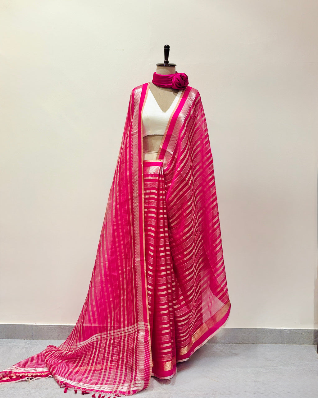 Fuchsia soft organza saree with zari stripes detail