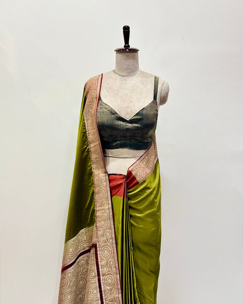 A buttery-soft and rare moss olive satin silk sari