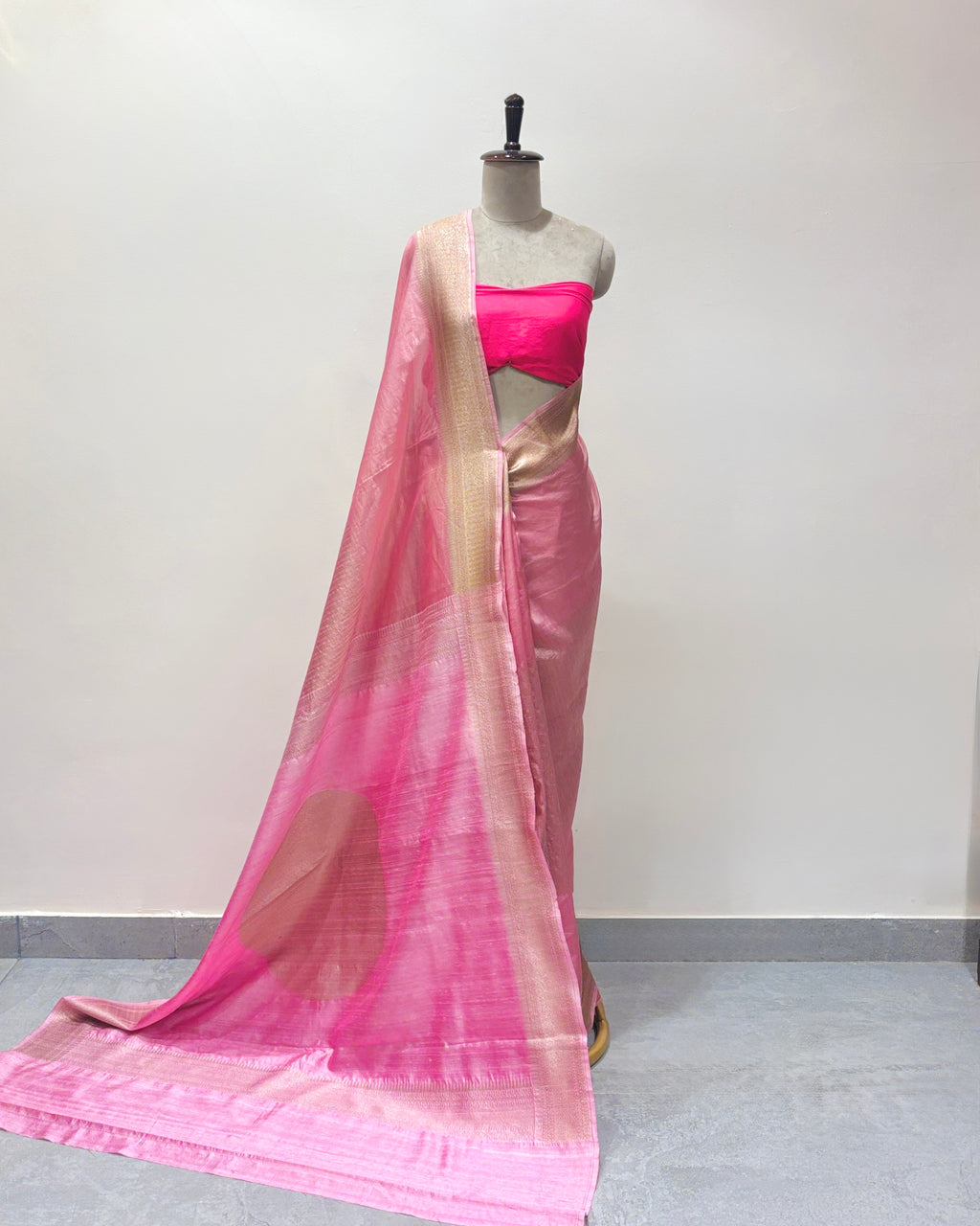A contemporary handwoven powder pink saree