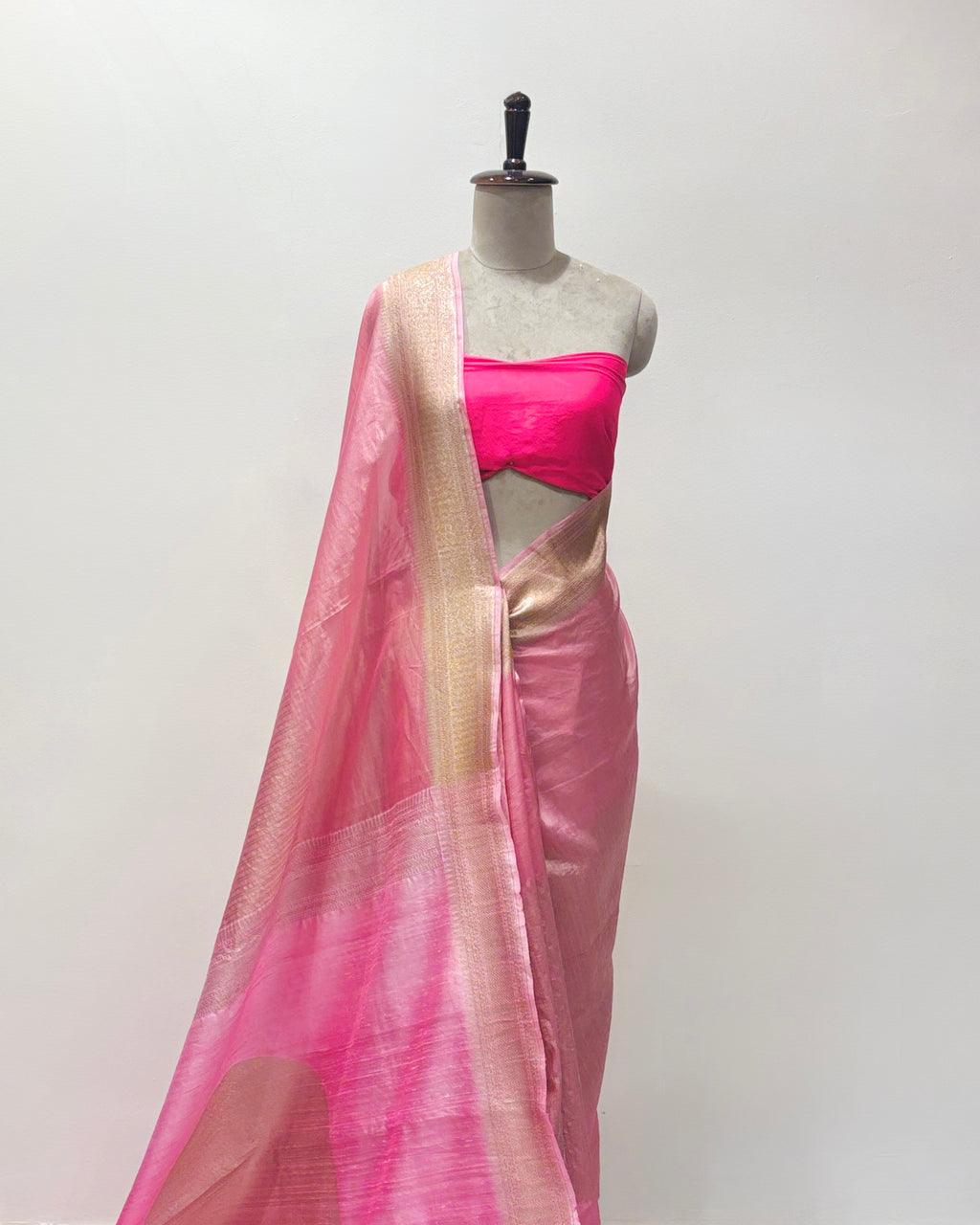 A contemporary handwoven powder pink saree