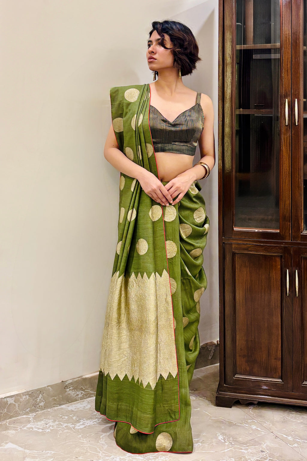 Precisely finished Handwoven muga Georgette sari with polkas