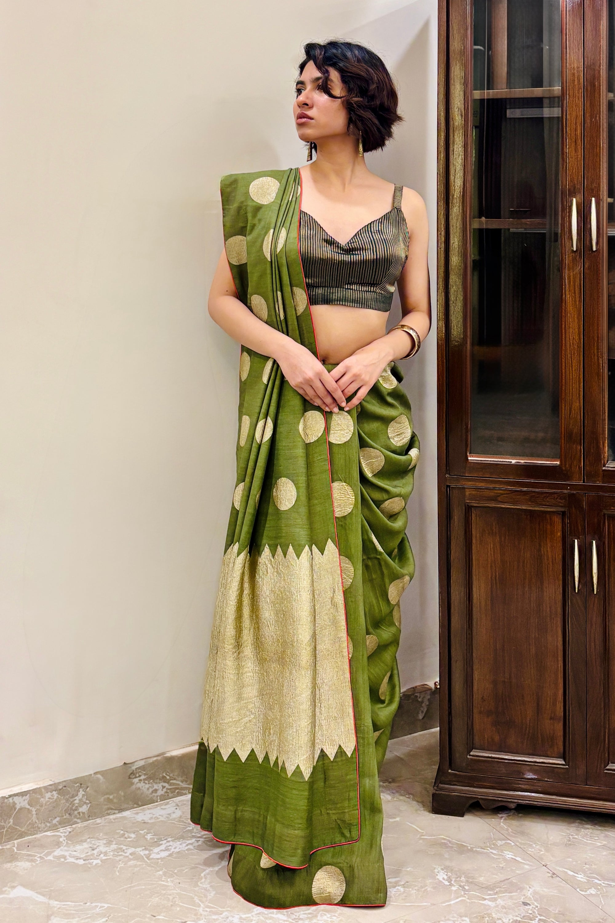 Precisely finished Handwoven muga Georgette sari with polkas
